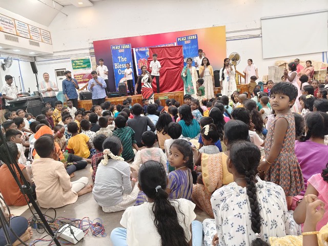 Children watching a Bible story presentation