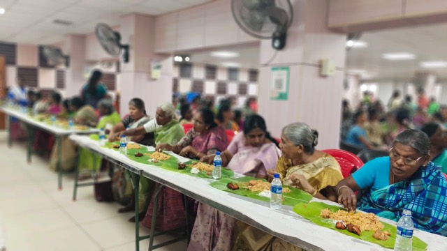 Guests sharing a meal on banana leaves