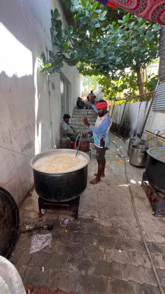 Cooking in large pots for the community meal