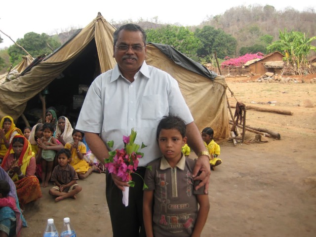 Visiting families in a village
