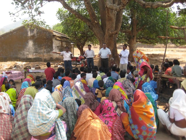 A village gospel meeting under the trees