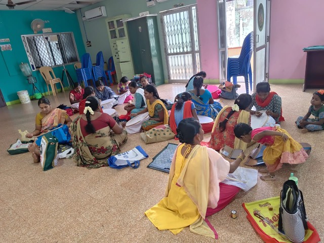 Women practising embroidery together