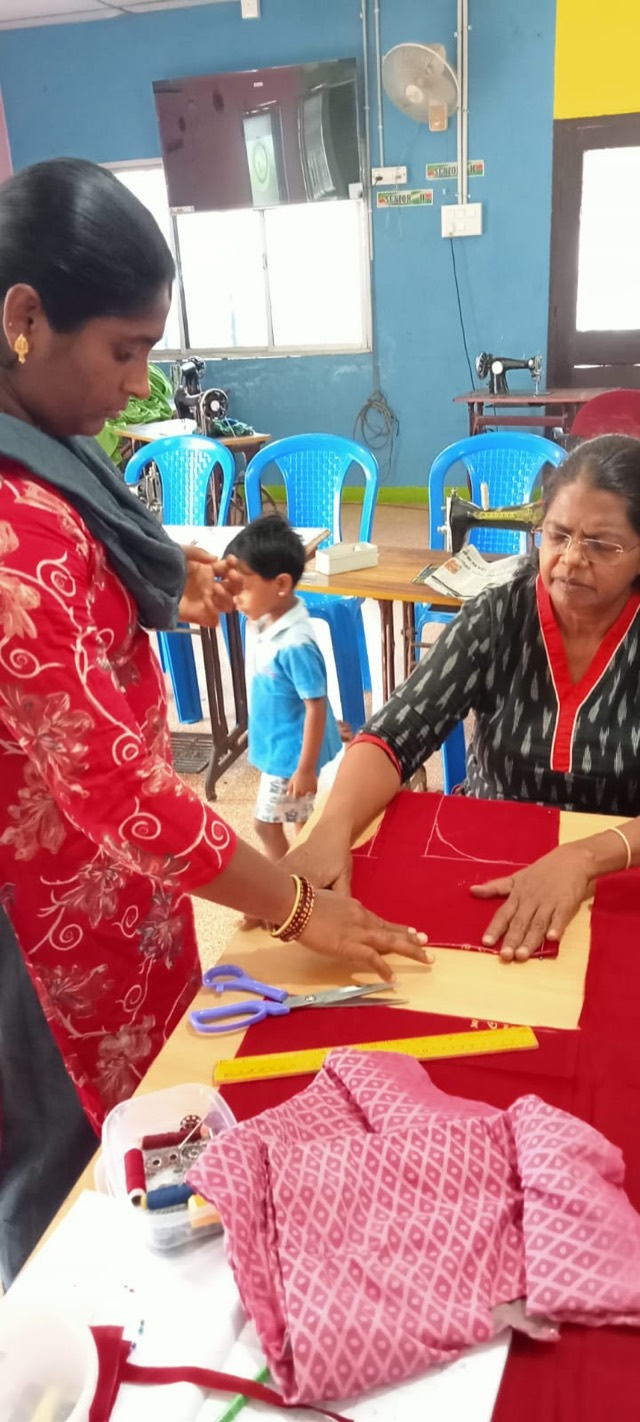 A tailoring lesson, cutting fabric