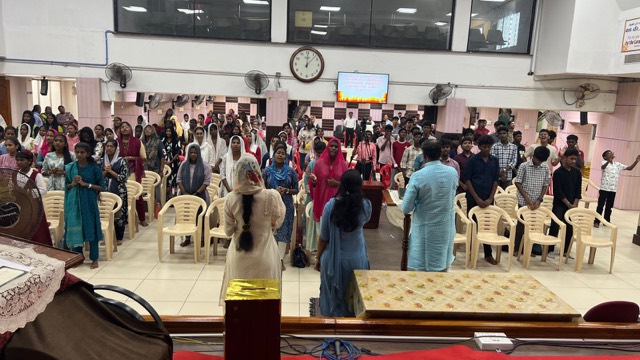 Believers gathered for a prayer meeting