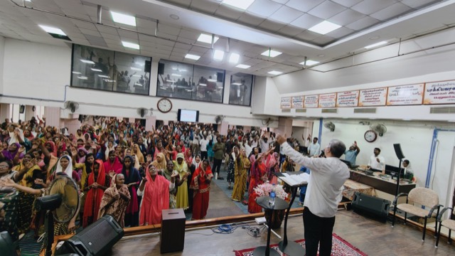 Praise and worship with hands raised