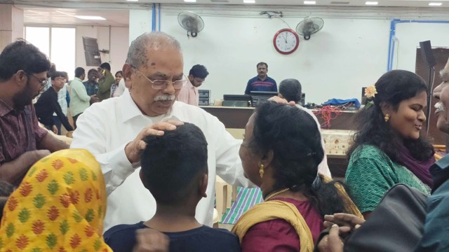Praying for young people after a youth meeting